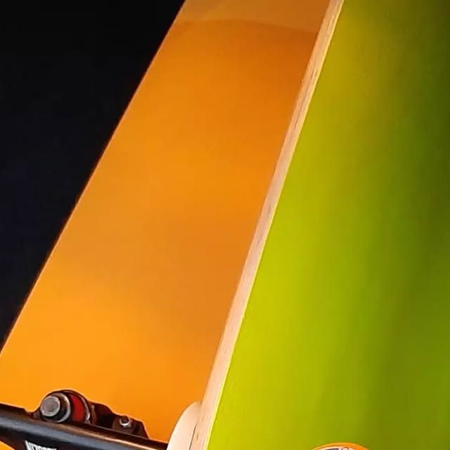 Deck underside — bright orange graphic