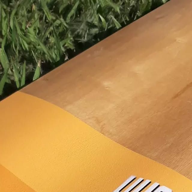 Deck on grass — yellow and orange